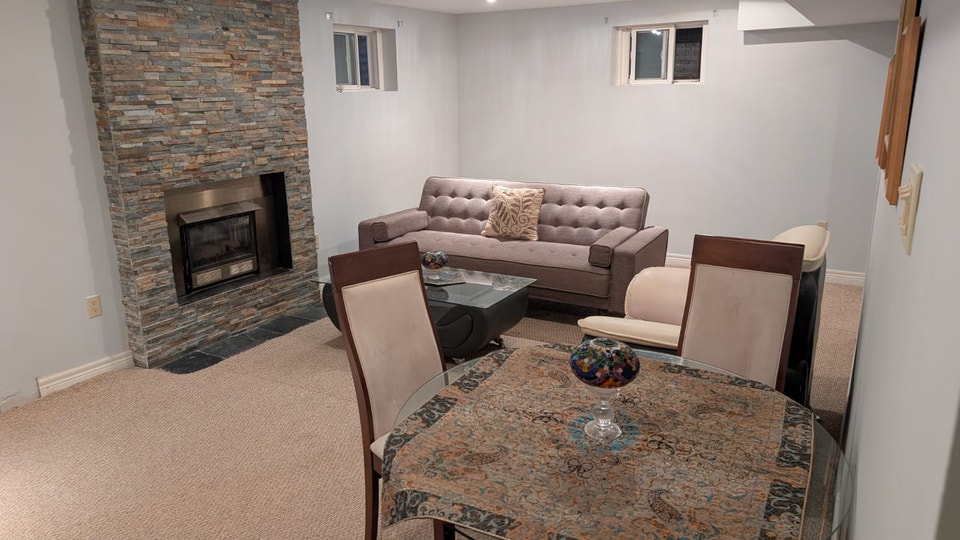 1300 Sq Ft 1 Bedroom Basement Apartment in  Royal Orchard 1