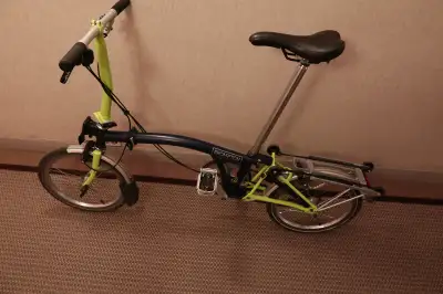 Brompton 2 speed C line Bicycle built in 2018. Excellent condition. Comes with storage bag and lugga...