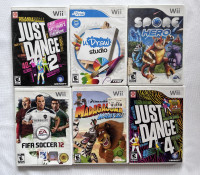 Assortment of Older Wii Games and Accessories