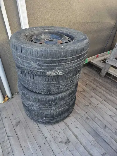 215/65 R16 Rims with tires. Bolt pattern 5x127mm Bore 71.6mm 100$ OBO Pickup in Winkler or could als...