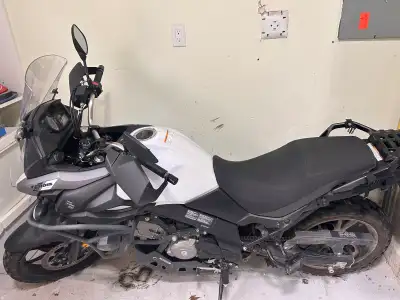 Suzuki vstrom 650 with 7300km on it. Stored indoors during the winter. It has the TREX accessories o...