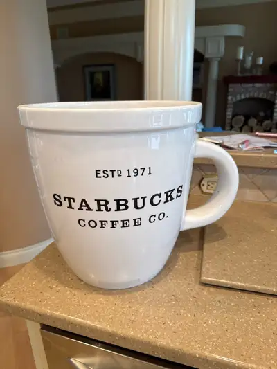 Starbucks decor over-sized mug Slight crack but repaired We used it on a shelf and you couldn’t see...