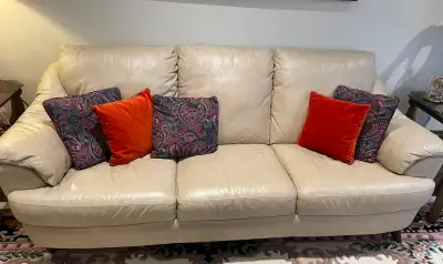 Leather sofas, coffee, and end table set, View more