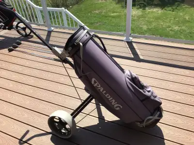 Spaulding golf bag and cart, View more