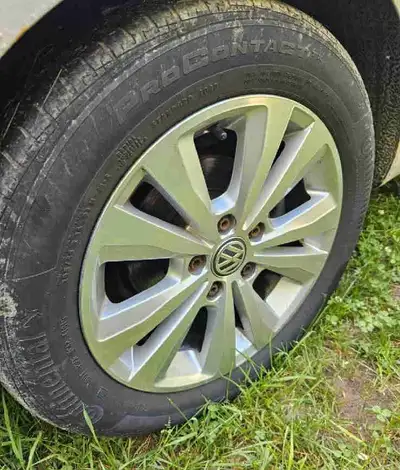 Nice set of 16" VW Alloys with Continental all seasons installed. Tires are good for the rest of thi...