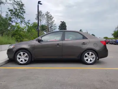 Well maintained KIA FORTE 2013 with low km.