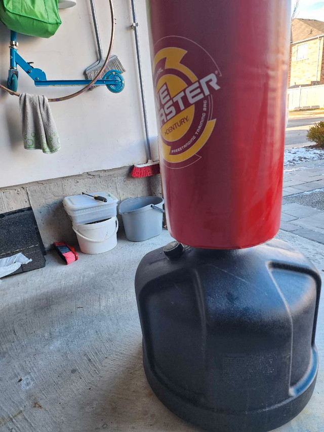 Punching bag with stand - Great condition barely used in Exercise Equipment in Markham / York Region