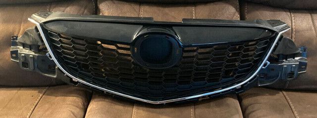 RP2802 2013-2015 Mazda CX-5 Black Front Grille PN: MA1200187 NEW in Auto Body Parts in Peterborough