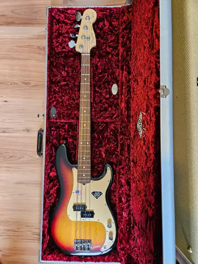 2006 Fender American 60th Anniversary Precision bass with silver special edition case. Bass is in ne...