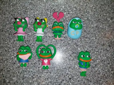 Here is a bundle of 7 Pepe the Frog meme figurines for display, they're in good condition overall. O...