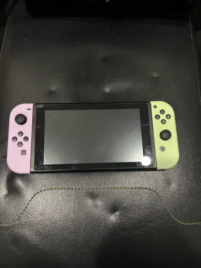 Nintendo switch in good working condition. Comes with charger. Has normal wear and tear. Price is fi...