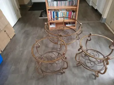 3 Coffee tables, one main and two end tables. Lg one is 36 Dia and 16" high, End tables are 24" Dia...