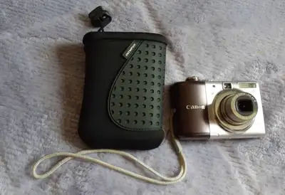 Canon PowerShot A1000-IS Digital Camera. Comes with a case, new batteries and an SD Card. $100.00 fi...