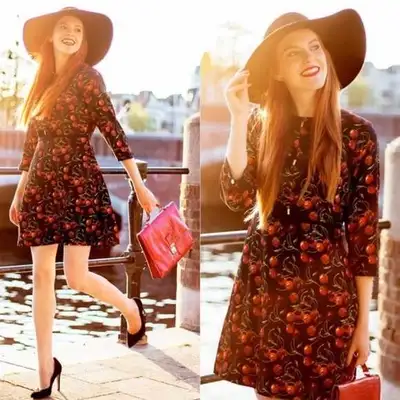 This is a Ted Baker Sew In Love dress with a fun cherry print and 3/4 sleeves, perfect for adding a...