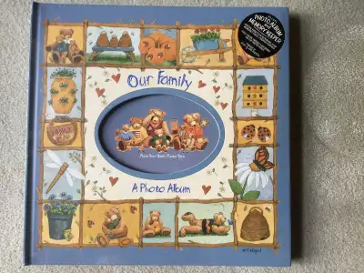 Hardcover 12 1/2" x 12 1/2" photo album in sealed plastic. Deluxe album and memory keeper Special pa...