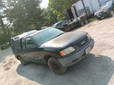 For parts, 2.2 driveline has good fenders and doors. Frames is no good, 5 speed manual.