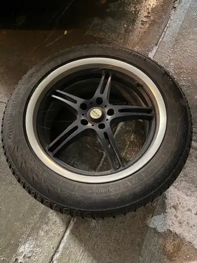 Set of 4 axis alloy wheels mounted with premium continental ice contact studded winter tires, used f...