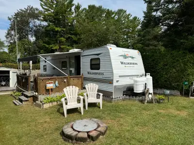 2005 - 32’ Fleetwood Wilderness Trailer. With bump out living and dining room. Sleeps 10 people Two...