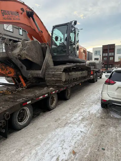 Up to 28 tons. No hassle. • Excavators, skid steers, loaders & more • Reliable, on-time transport •...