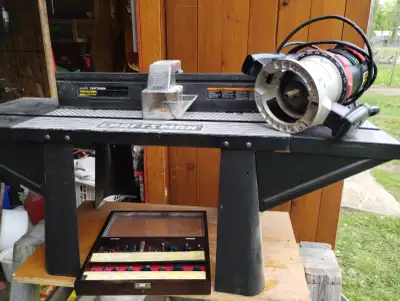 For sale: Craftsman Professional Router Table, Craftsman Router and case of wood molding bits. Hardl...