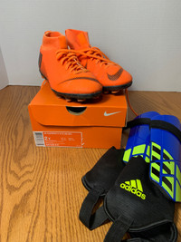 Kids Nike soccer shoes and adidas shin pads
