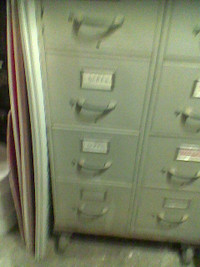 2 / 4 drawer fileing cabinet $ 100.00