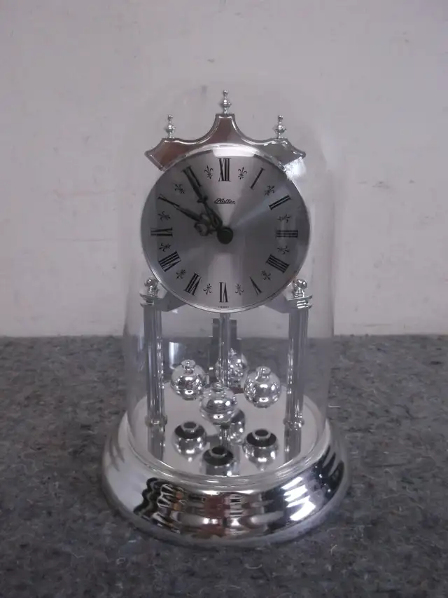 Haller Silver Anniversary Rotating Pendulum Mantel Clock63007359266051122