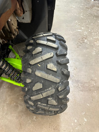 Arctic cat rims and 26” traxion gripper tires 