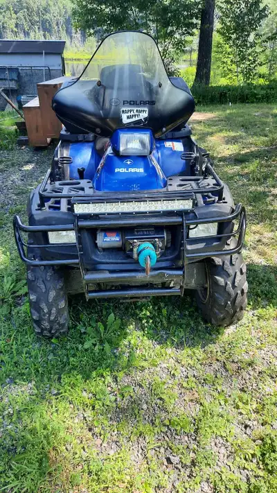 Selling my bike. Don't use it anymore. Comes with cover ,snow plow and dump trailer. Moves snow grea...