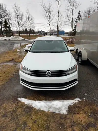 Low km vw Jetta, new snow tires, apple car play, great on fuel, works great