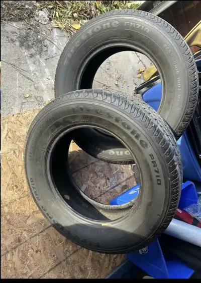 These are a pair of Firestone FR710 mud and snow tires, perfect for getting through the winter month...