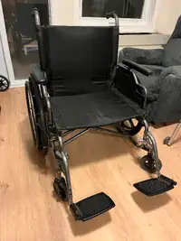 Wheel chair practically new !