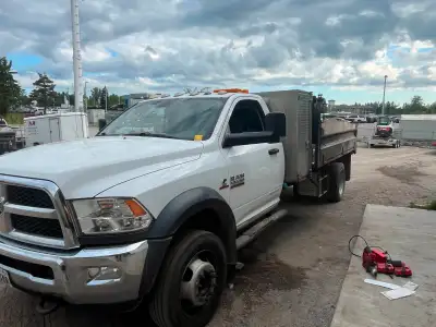 - Cummins Diesel, 4x4, Power Dump Box with drop sides, Tow package with rearview camera, Behind cab...