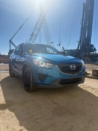 I have a 2014 cx5 2.0l fwd 6 speed for sale runs and drives great has a throw out bearing making noi...