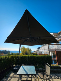 11' Umbrella Cantiliver with sand base - $610