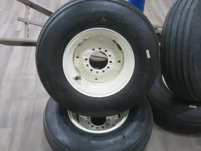 9.5L15 or 11L15 Implement tire on rim. Standard (6 bolt, 6” bolt circle, 4 5/8” center hole). $250 e...