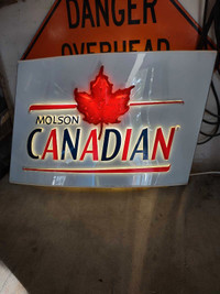 Lighted Molson Canadian sign