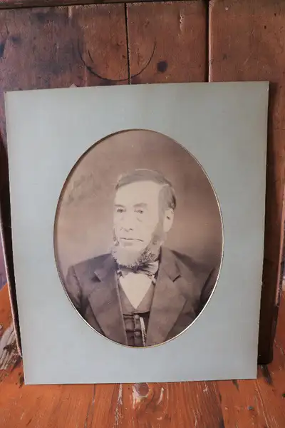 Hi. I have an old large cabinet card/print of a man for sale. The picture is taped to old matting. T...