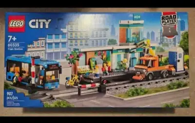This LEGO City 60335 Train Station set includes 907 pieces for building a detailed city scene with a...