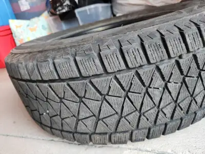 Winter tires 235 65 R 17 brand Blizzak good condition.