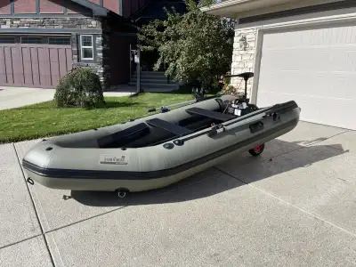 12.6 ZODIAC FISH 'N HUNT INFLATABLE BOAT The Zodiac Fish 'n Hunt is a rugged inflatable boat designe...