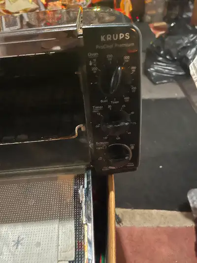 Toaster oven small black  works great 25.00, View more