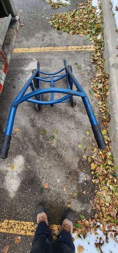 Steel drum dolly for standard 55-gallon barrels. Weighs approx. 50 lbs. Smooth-rolling casters, stro...