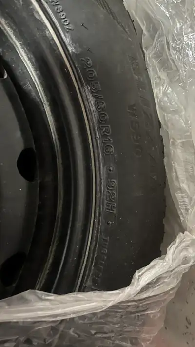 only used one month. Bought another car. Bridgestone-Blizzak Icepeak 205/60R16 Rims included. C-ST-w...