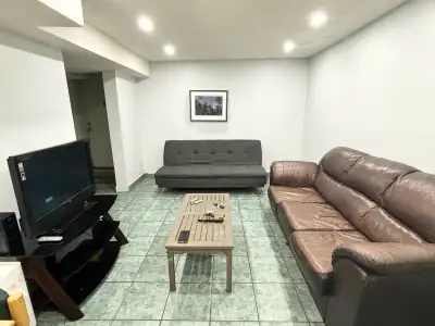 Welcome home to a spacious, immaculately maintained 2-bedroom basement apartment nestled in a peacef...