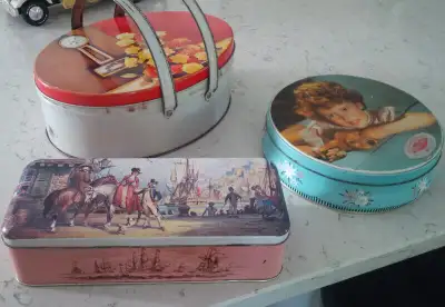 $20 Each 1) 2-Handled Picnic Tin, displaying banjo clock, Oval, 11 inches across 2) Bright Eyes, W....