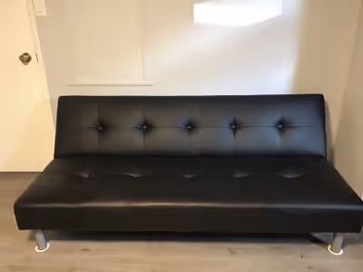 Anyone interested in a black sofa bed, often called a Futon, for their apartment, office, spare bedr...