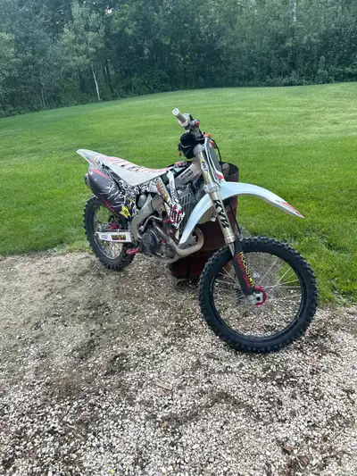 Runs great front forks and rear shock rebuild last fall. New breaks this spring.