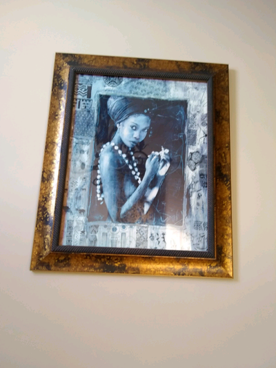 Beautiful framed wall art. 29"W x 35"H. In perfect condition.
