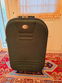 A Luggage with Wheels, in Good Condition, Clean, Size 25*45*55cm